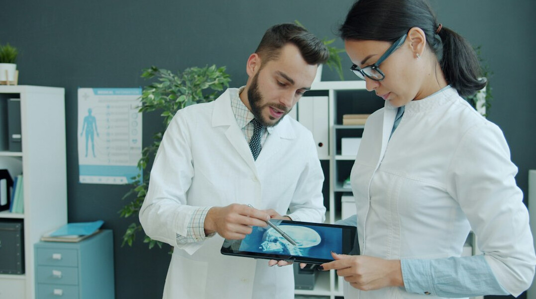 team of doctors discussing