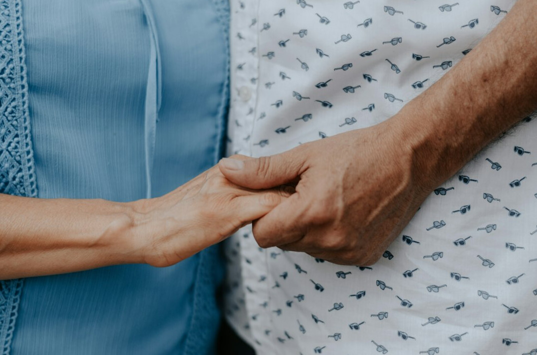 nurse helping elderly patient